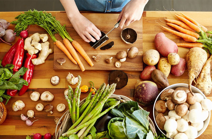 woman cooking vegetables