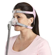 Woman with ResMed Mirage FX For Her Nasal CPAP Mask with pink headgear
